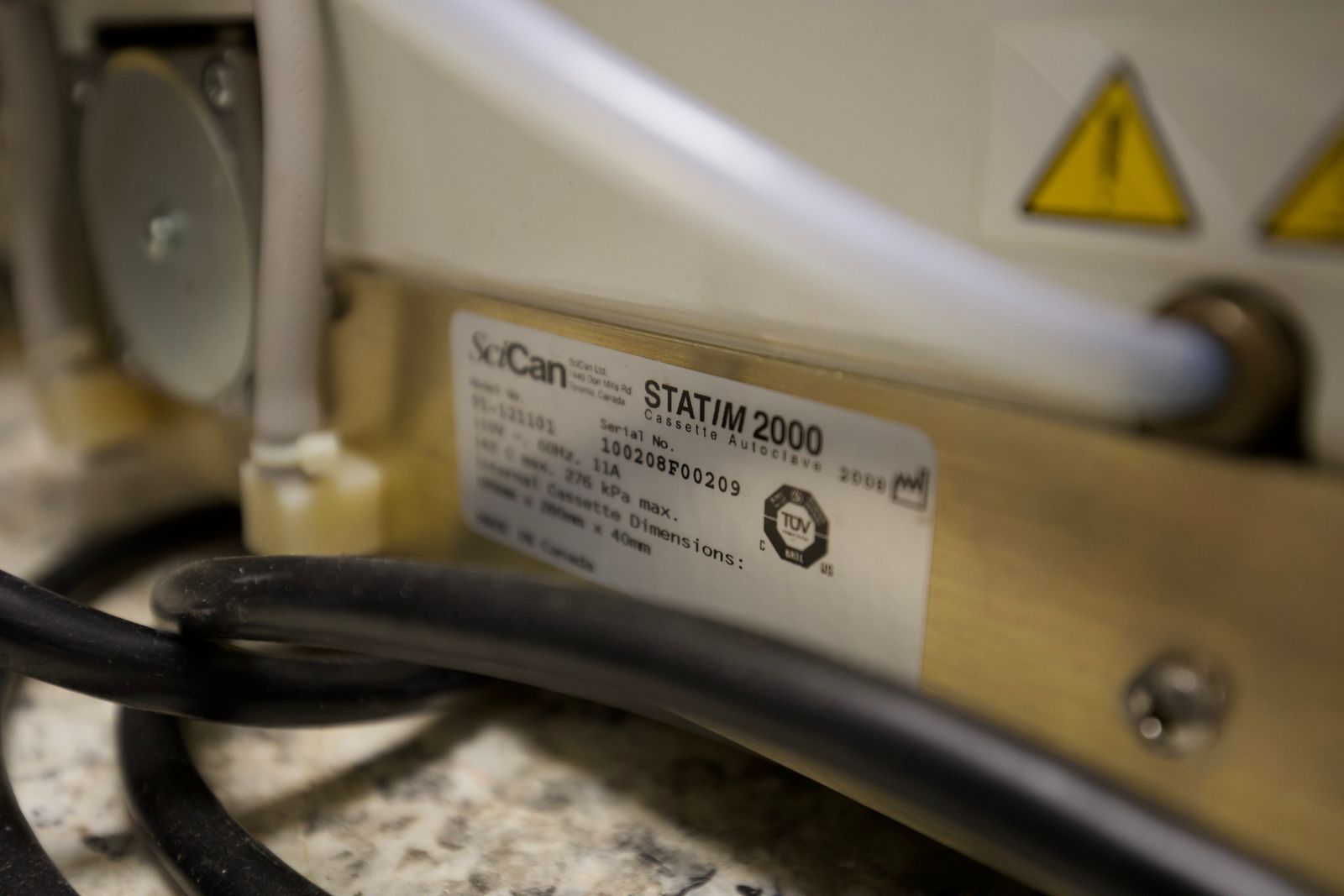 Close-up of a SciCan Statim data plate