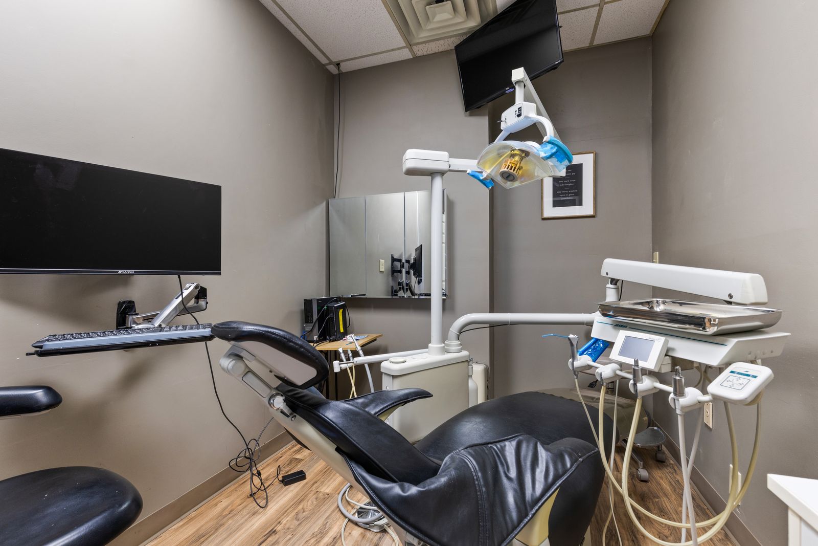 Finished dental operatory photographed for its auction listing